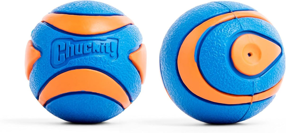 2_loose_medium_sized_chuckit_squeaker_balls on a whte background