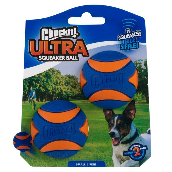Chuckit! Ultra Squeaker Ball dog toy packaging with two balls on a grassy field background.