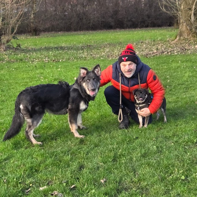 UK Canine Behaviour expert with dogs, showcasing expert-led curation for Paw Branch dog birthday boxes.