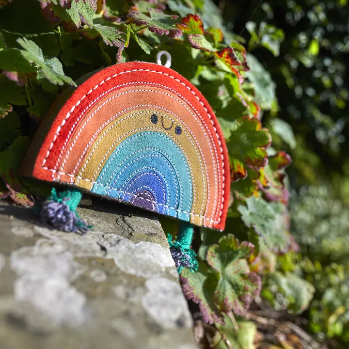 Rainbow Warrior eco dog toy by Green and Wild’s suitable for medium, large and extra large sized dogs photographed outdoors supplied by Paw Branch