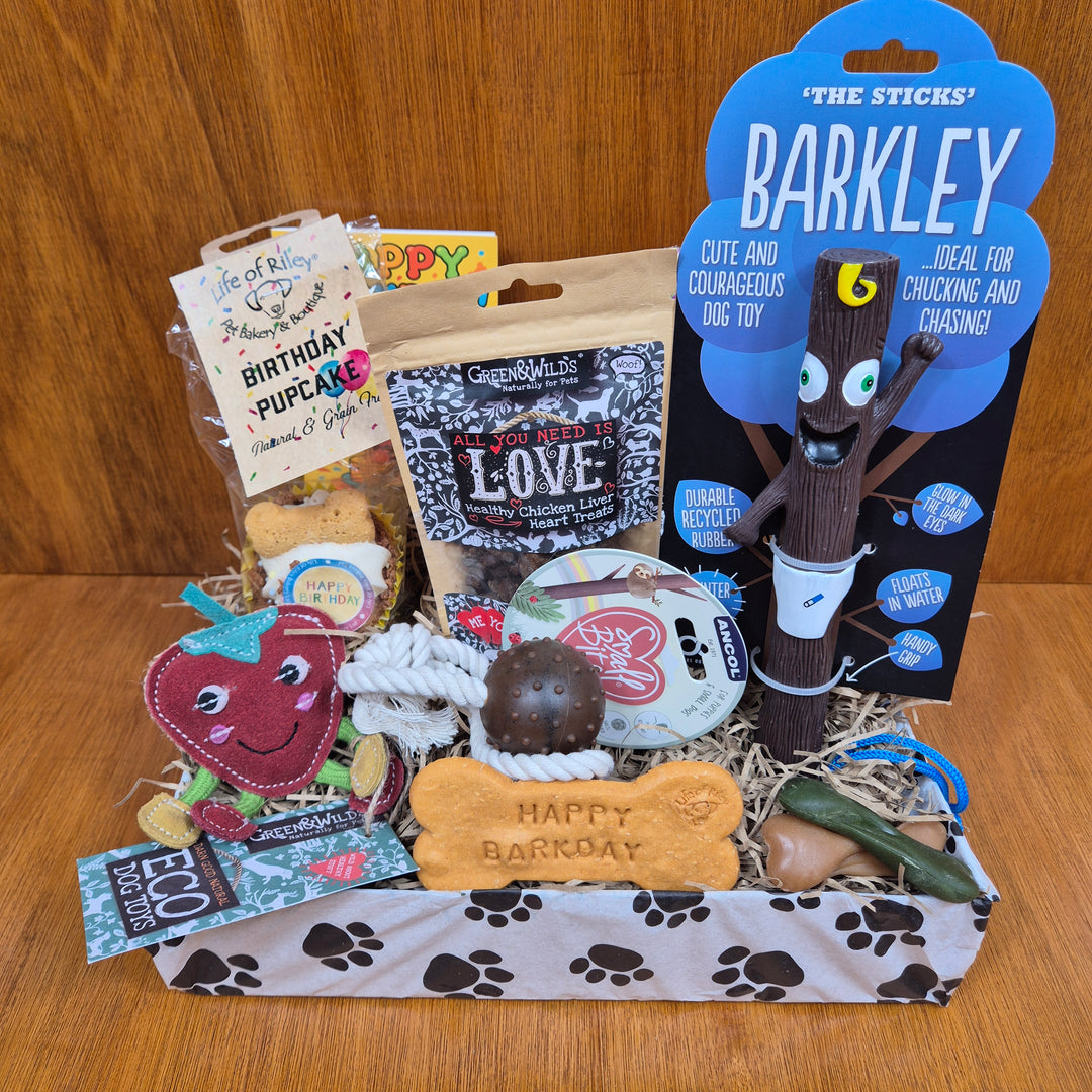 The Top Dog Birthday Box is packed with natural treats and eco toys for tiny companions.