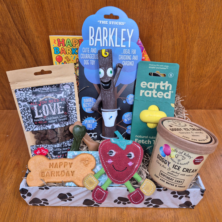 Top Dog Birthday Box to reveal a mix of fun toys and wholesome treats for extra small dogs.
