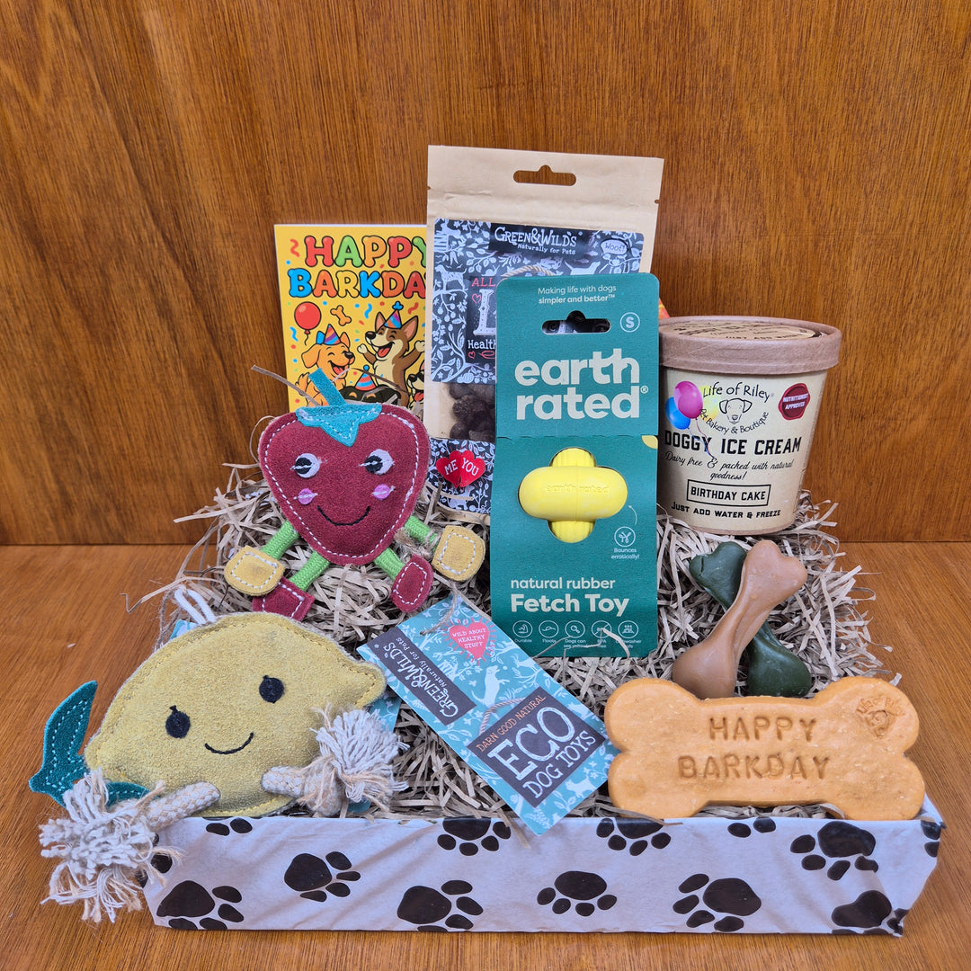 Surprise senior extra small dogs with the Top Dog Birthday Box of natural treats and eco-friendly toys.