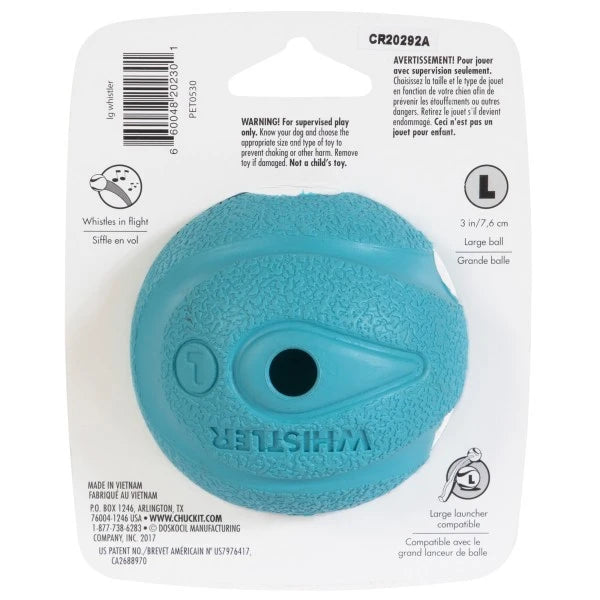 A blue textured rubber dog toy with a circular center hole, mounted on a white cardboard backing with printed instructions, a barcode, and size information. The brand name 'Whistle r' is embossed on the toy.