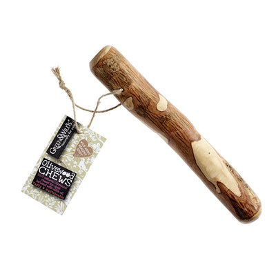 large olivewood Dog chew treat with packaging on a white background